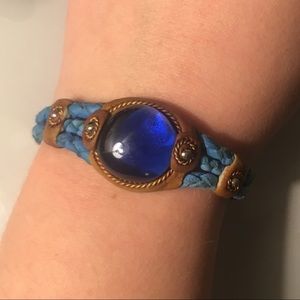 Blue braided bracelet with dark blue stone